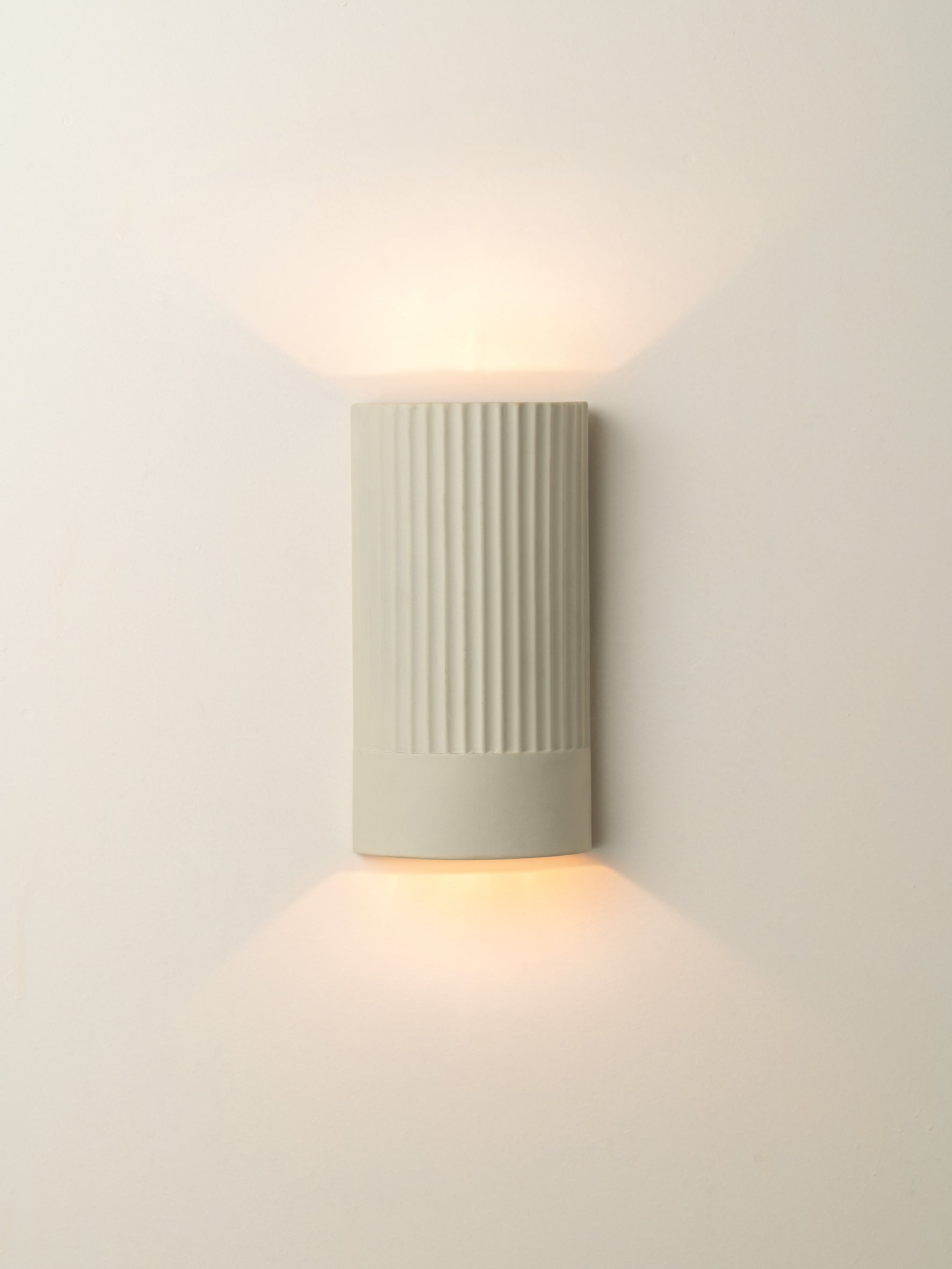 Enza - warm white  ribbed concrete wall light | Wall Light | Lights & Lamps | UK | Modern Affordable Designer Lighting