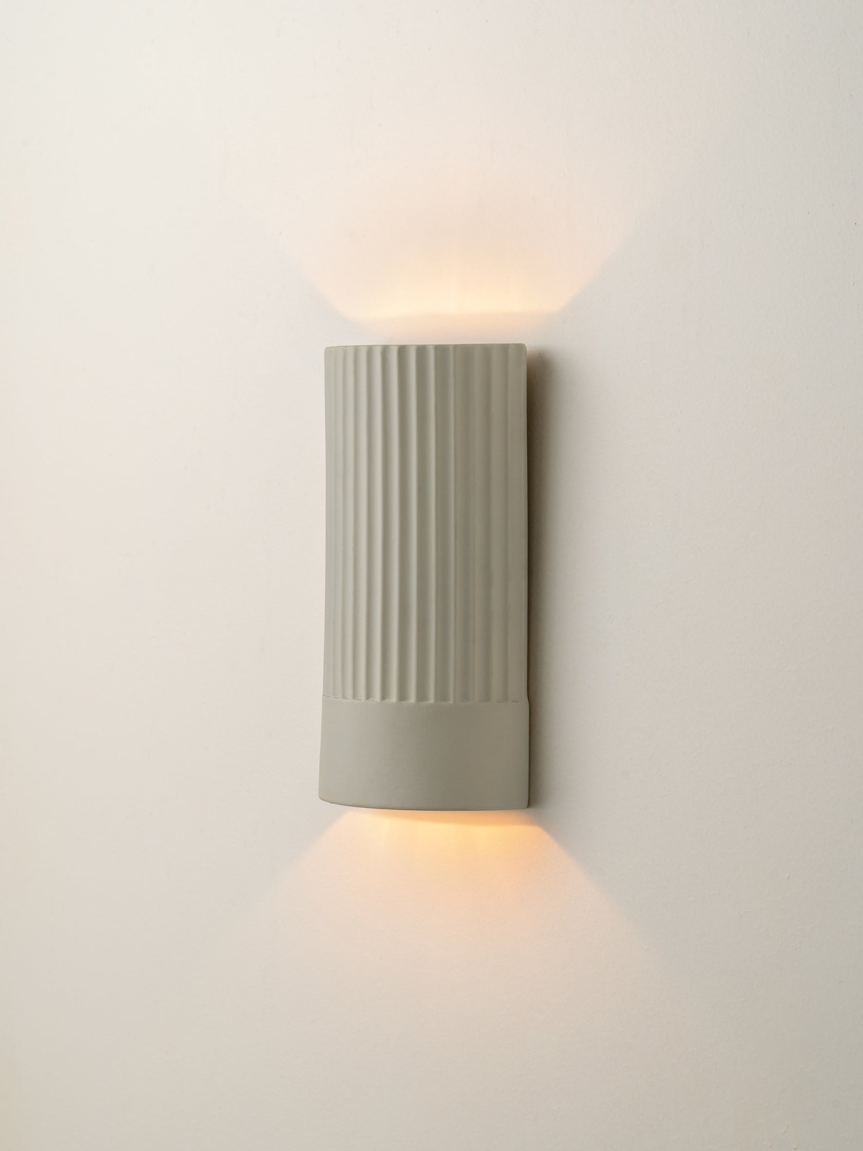 Enza - warm white ribbed concrete wall light | Wall Light | Lights & Lamps | UK | Modern Affordable Designer Lighting