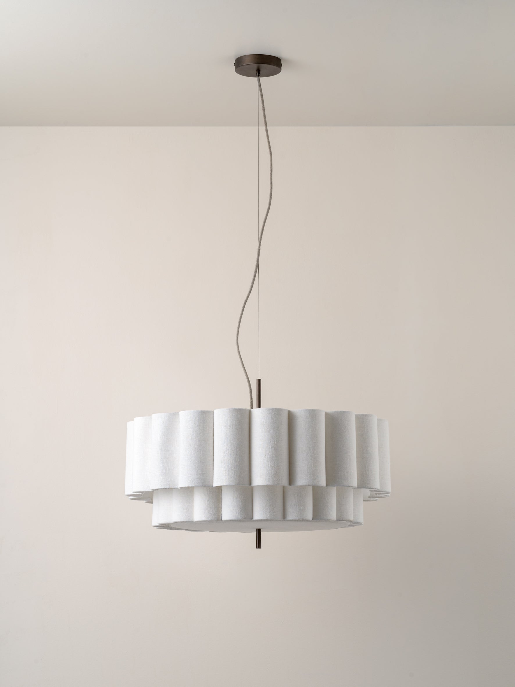 Scalloped shade pendant deals light