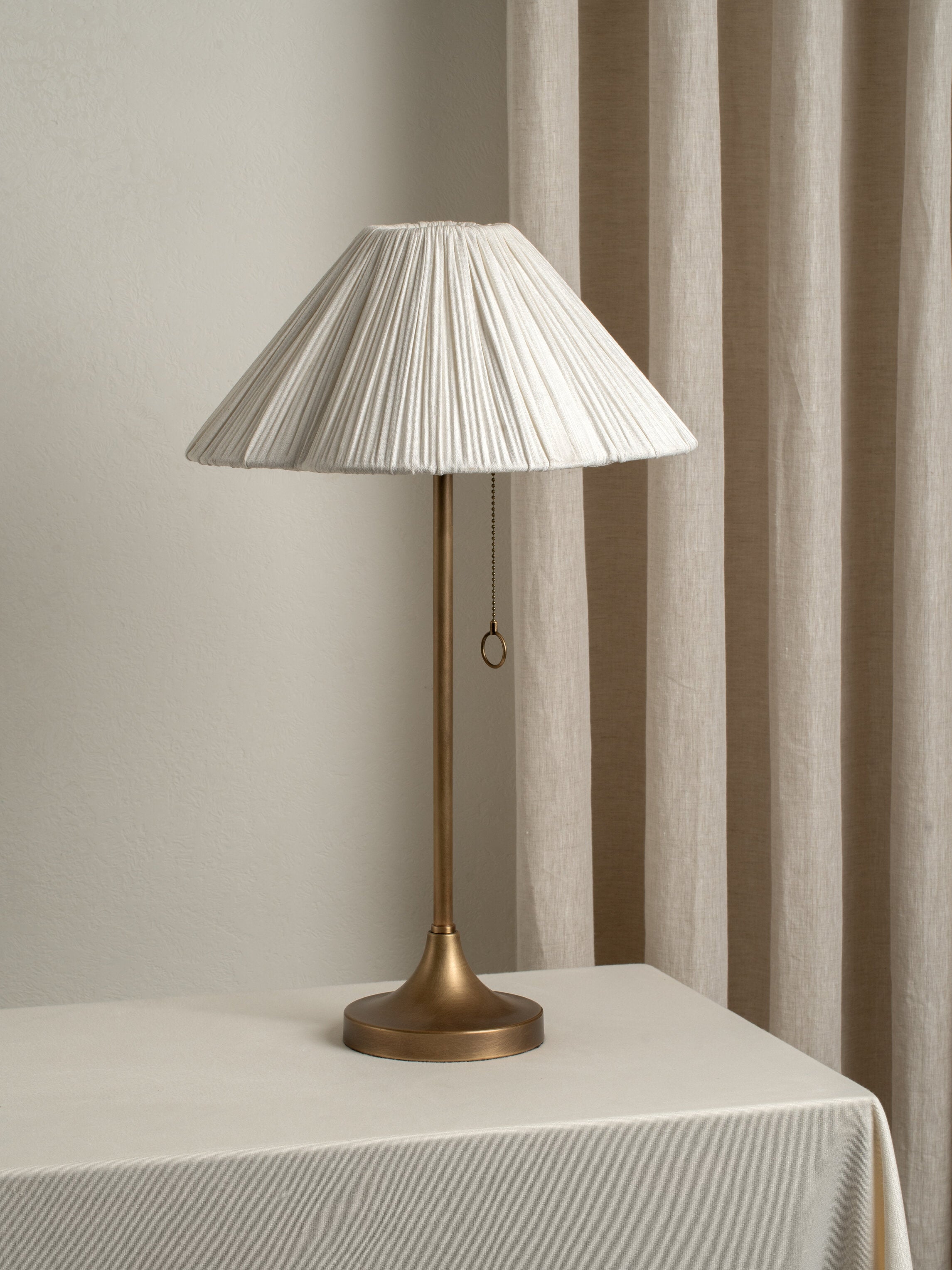 Lindi - aged brass and scalloped linen table lamp | Table lamp | lights & lamps | UK | Modern affordable designer lighting