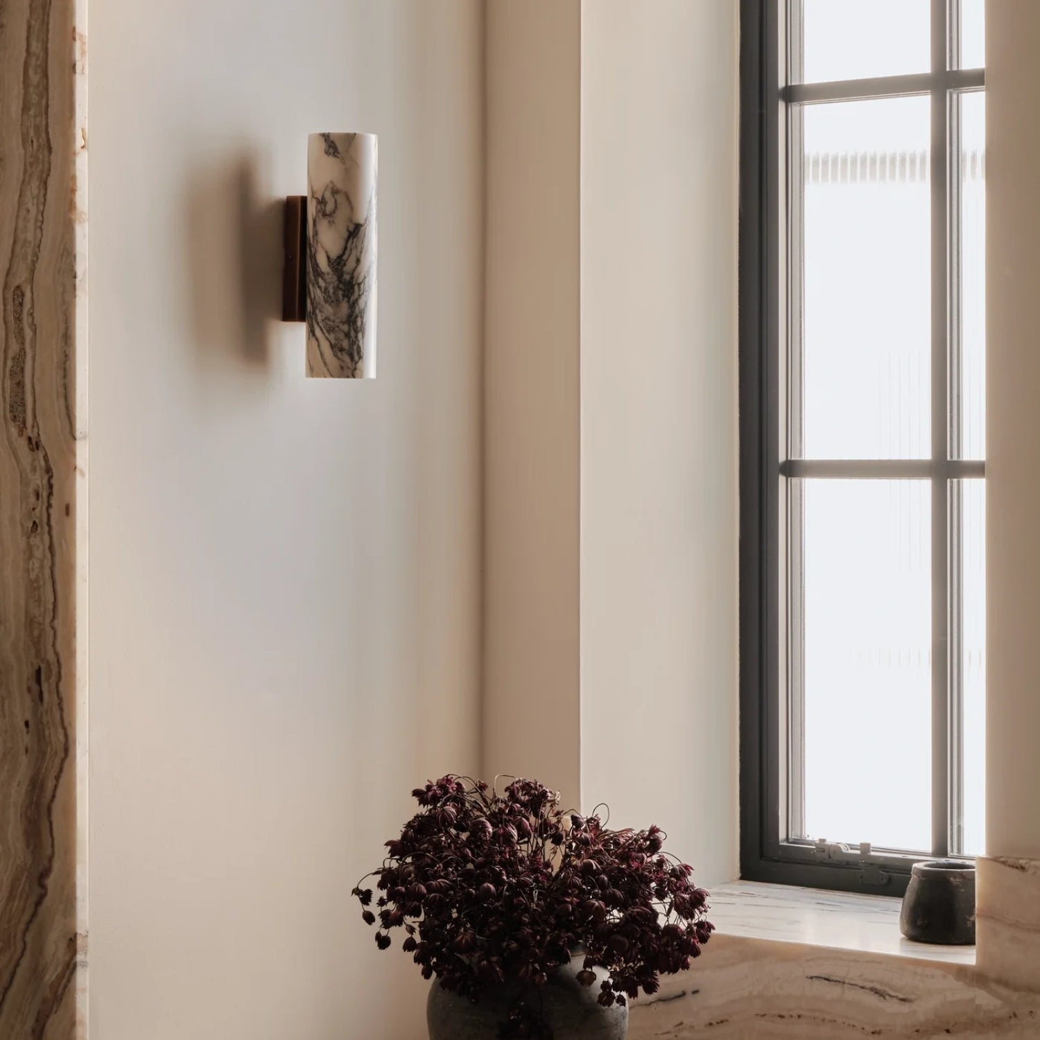 Why brass wall lights endure in contemporary interiors