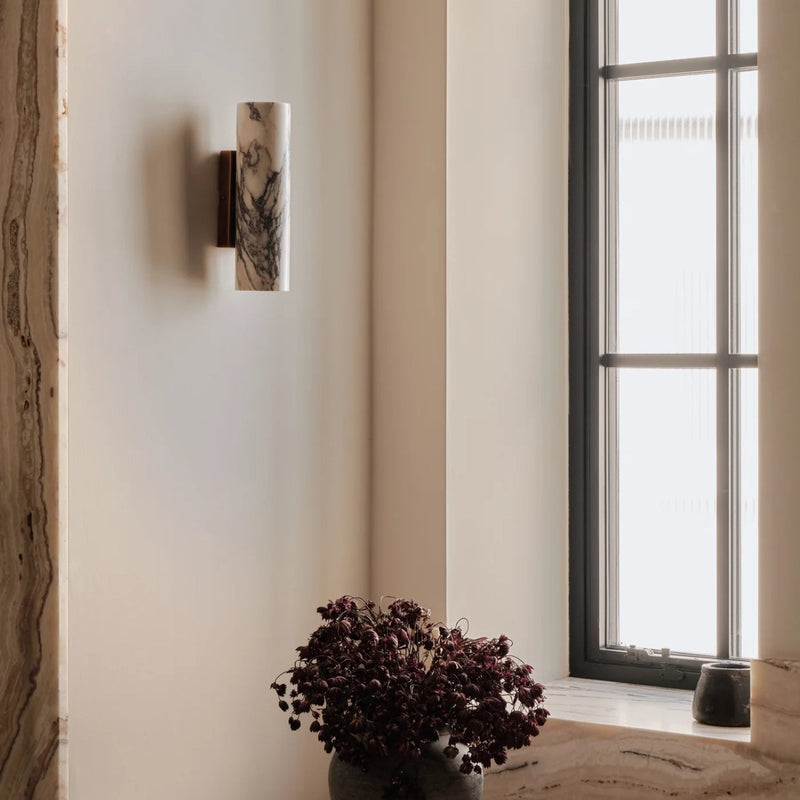 Why brass wall lights endure in contemporary interiors