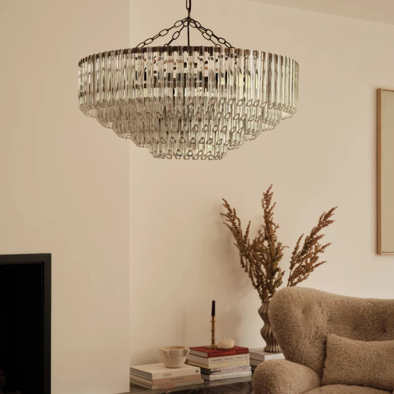 Vintage brass chandeliers and the architecture of gathered light