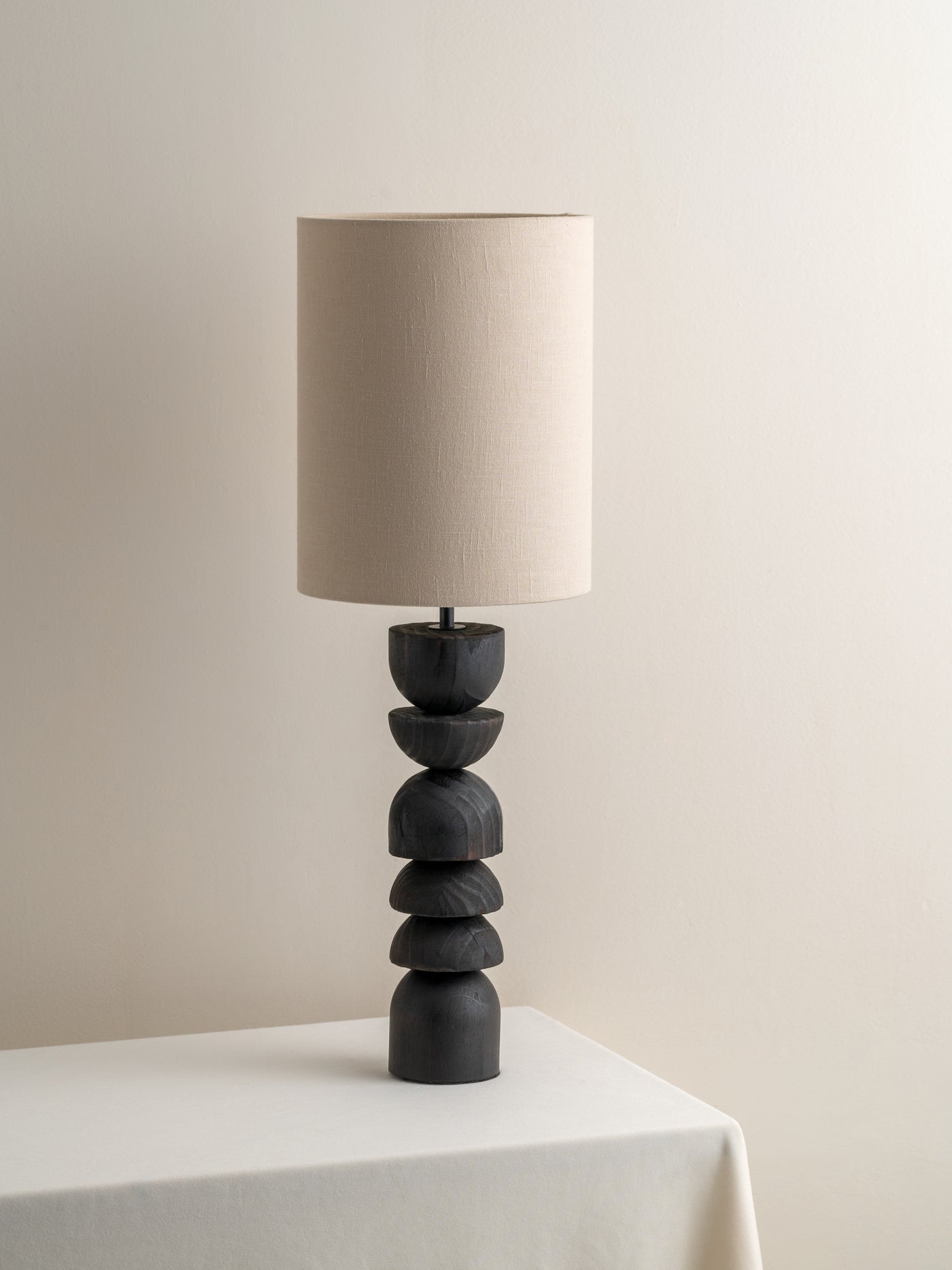 Aska tall charred wood and natural linen table lamp