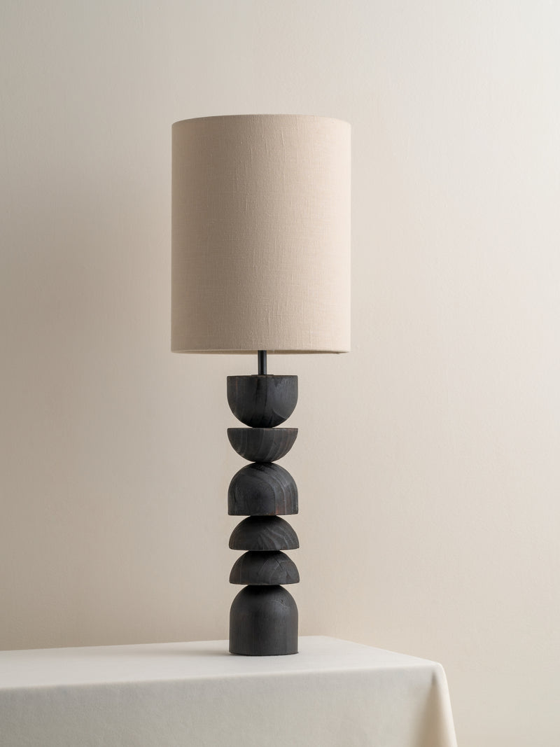 Aska tall charred wood and natural linen table lamp