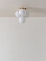 Boule - 4 light brass and opal flush pendant light