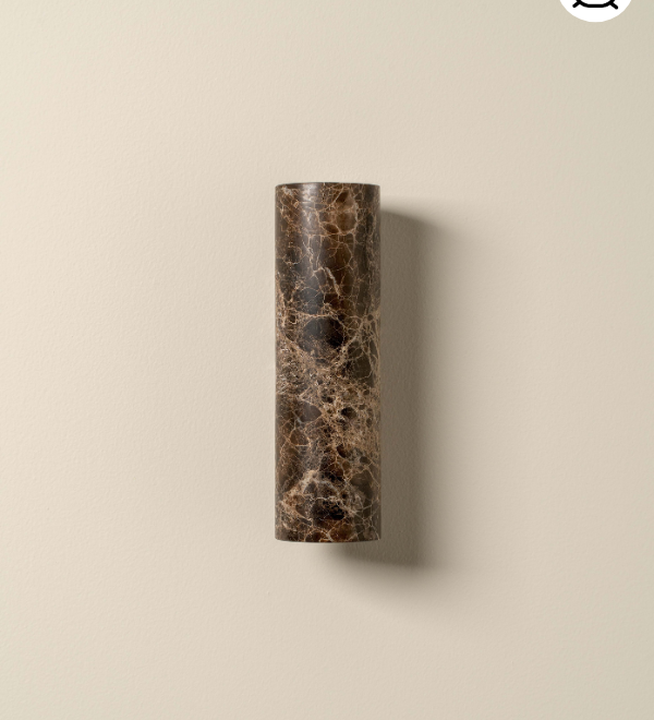 brown marble wall light on beige background with bathroom sticker