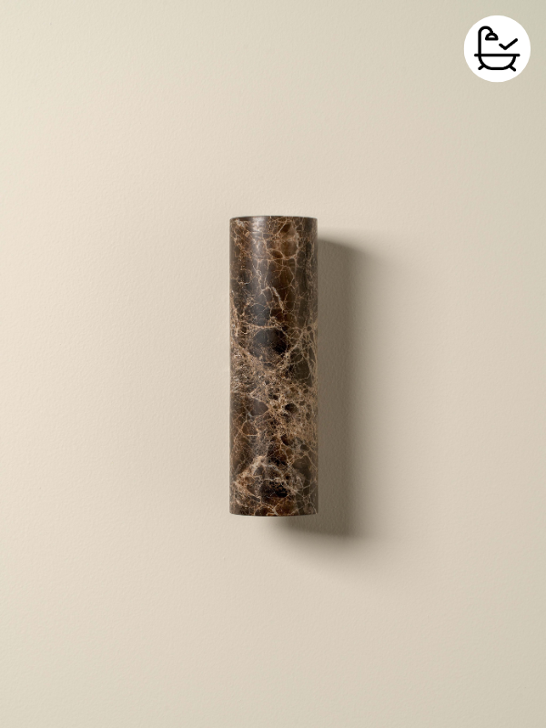 brown marble wall light on beige background with bathroom sticker