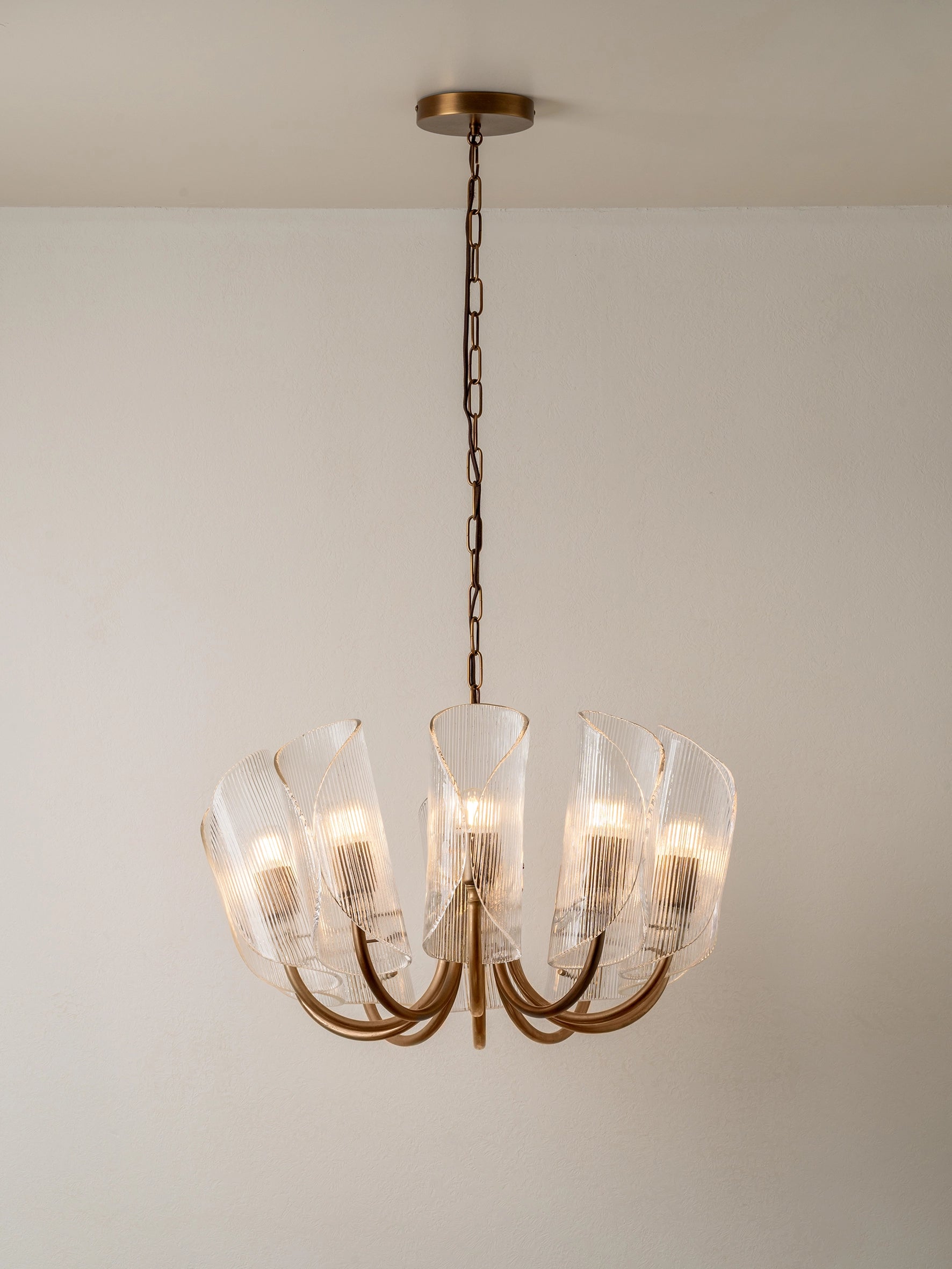 Cannoli - 10 light aged brass and textured glass chandelier | Ceiling light | lights & lamps | US | Modern affordable designer lighting