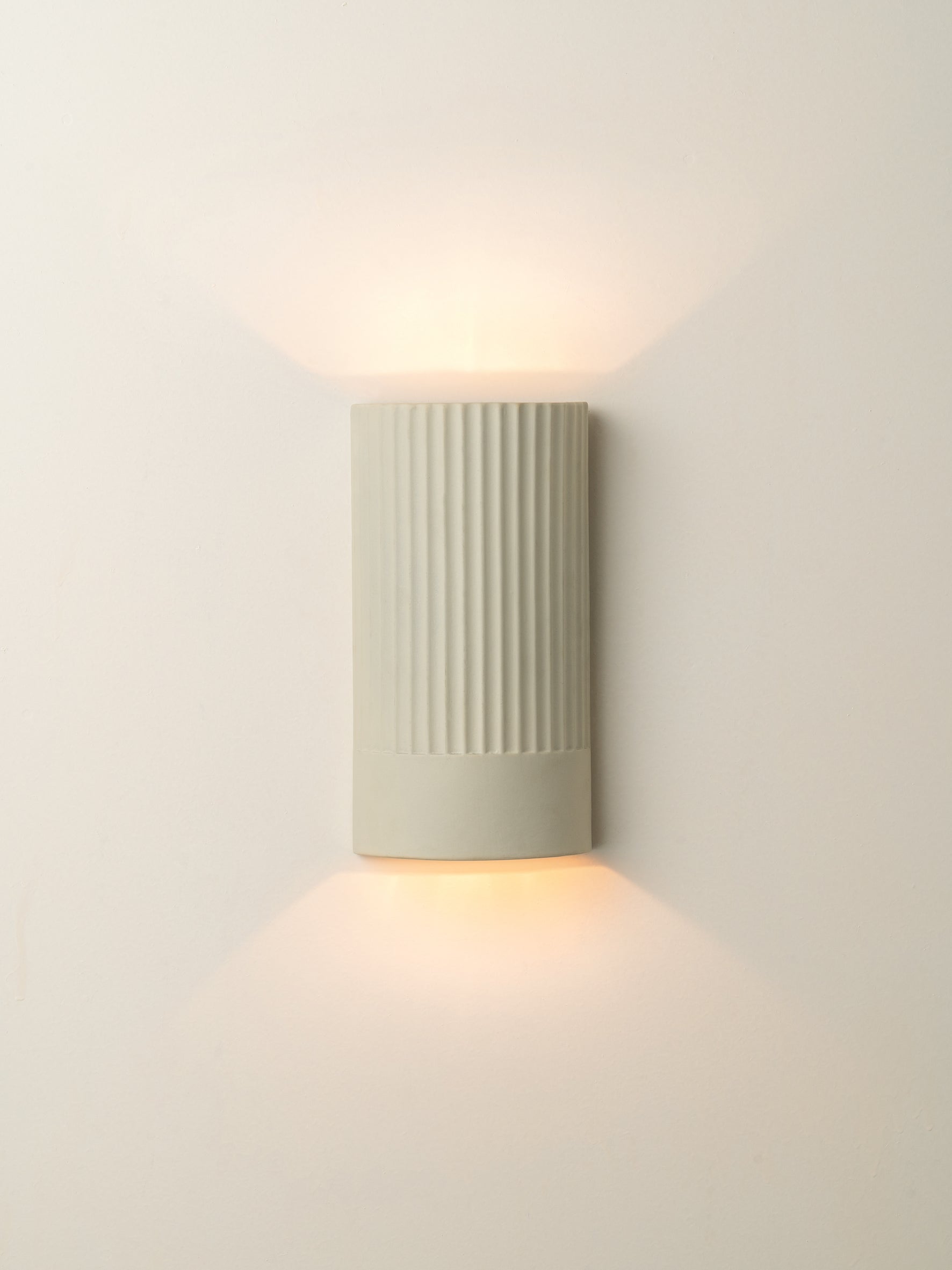 Enza - warm white  ribbed ceramic wall light | Wall Light | lights&lamps | UK | Modern Affordable Designer Lighting