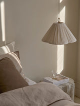 Lindi - small aged brass and linen scalloped pendant