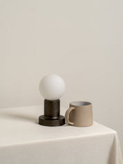 Porta bronze and opal rechargeable table lamp | Table Lamp | Lights & Lamps | UK | Modern Affordable Designer Lighting