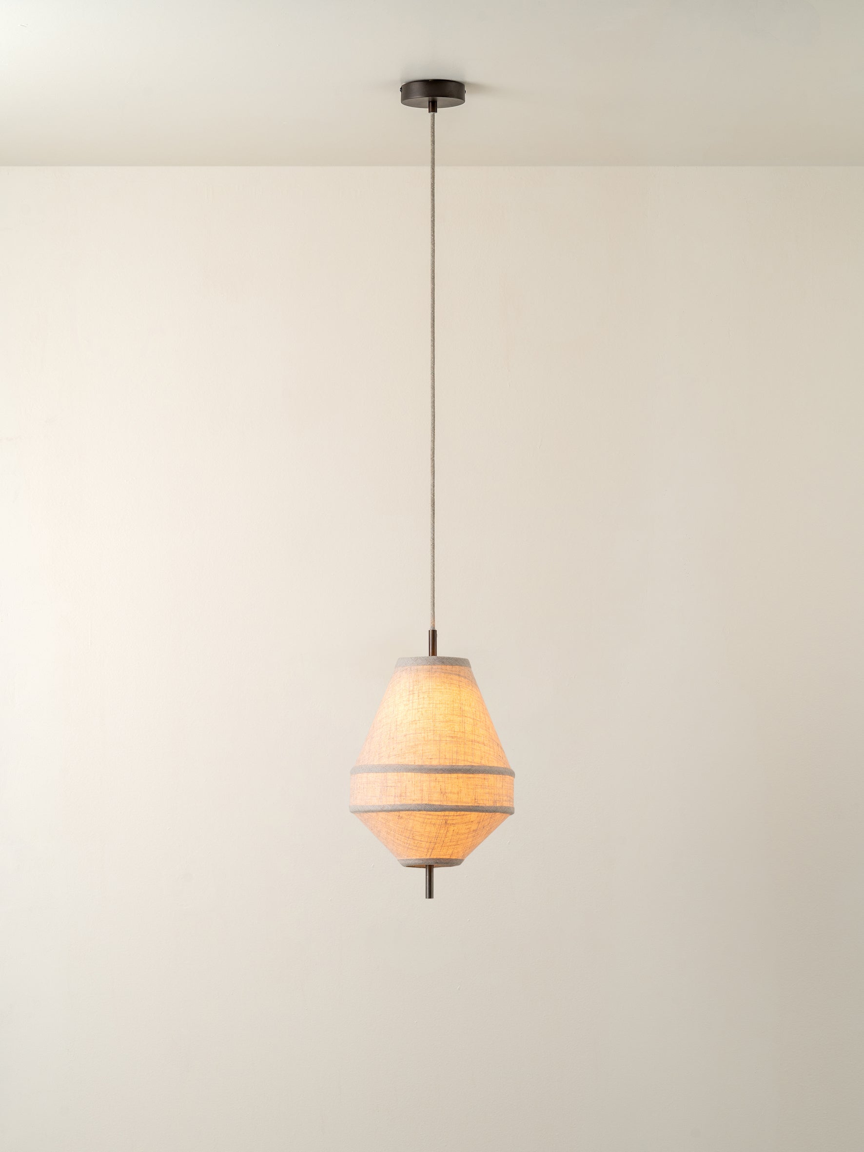 Solara - small aged brass and layered natural linen pendant