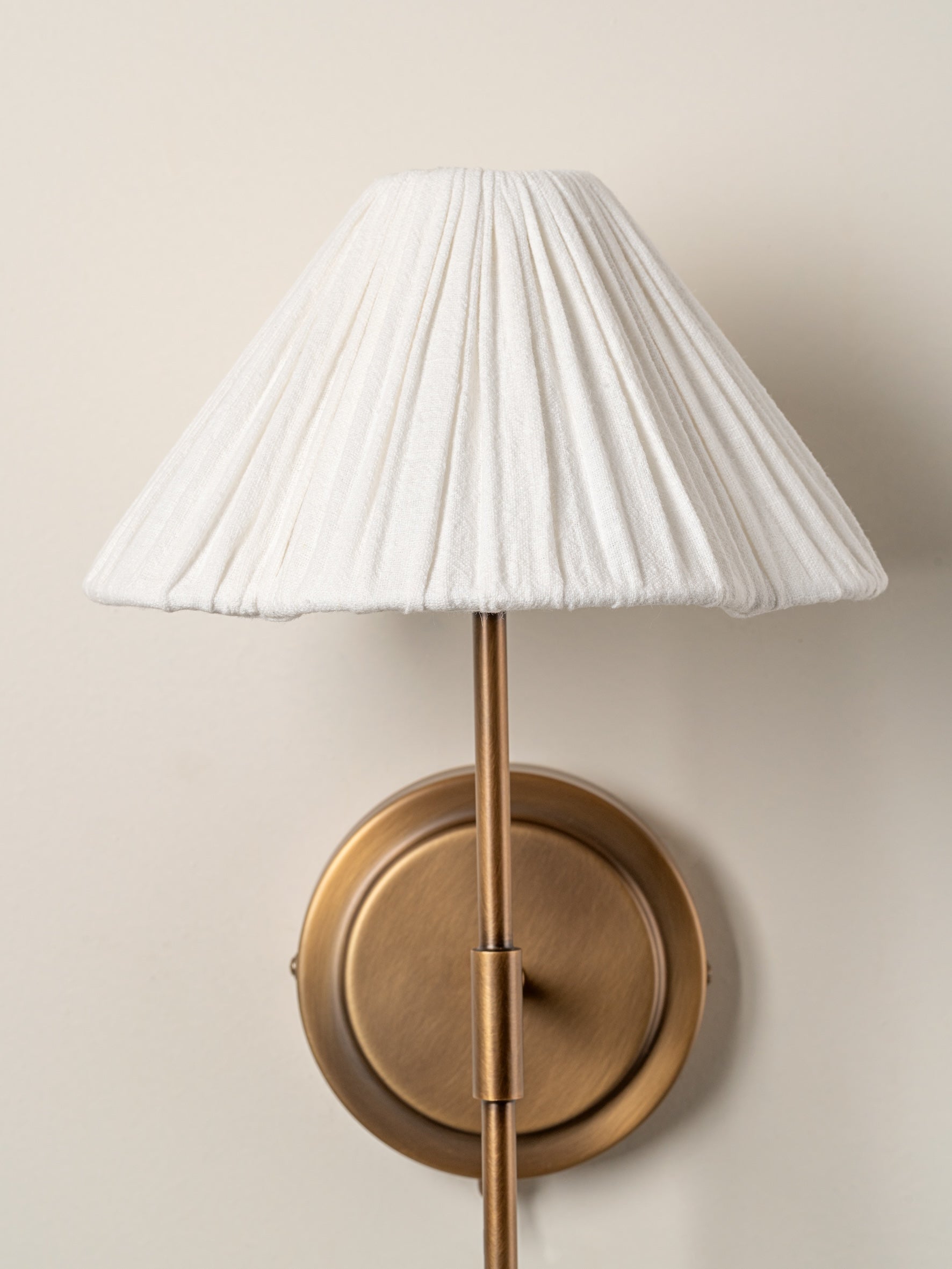 Lindi - aged brass and linen scalloped wall light | Wall Light | lights&lamps | UK | Modern Affordable Designer Lighting