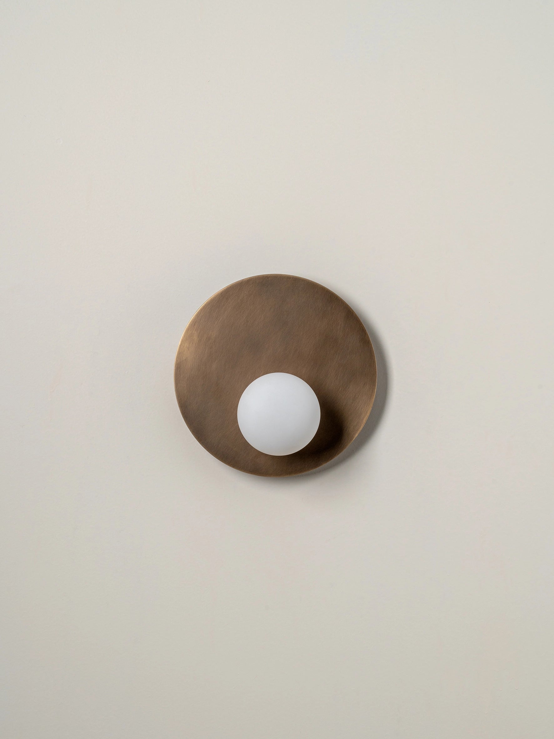 Luna - aged brass and opal disc wall light | Wall light | lights & lamps | Modern affordable designer lighting