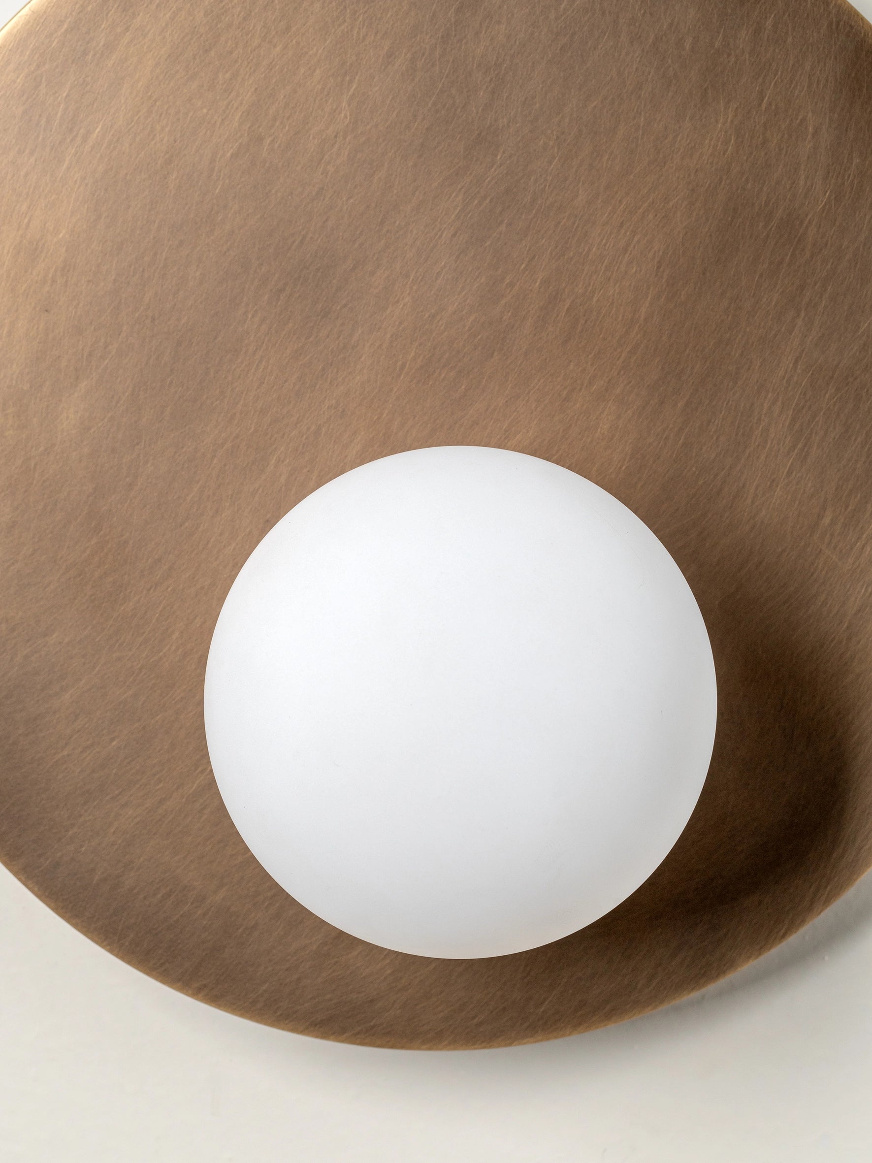 Luna - aged brass and opal disc wall light | Wall light | lights & lamps | Modern affordable designer lighting