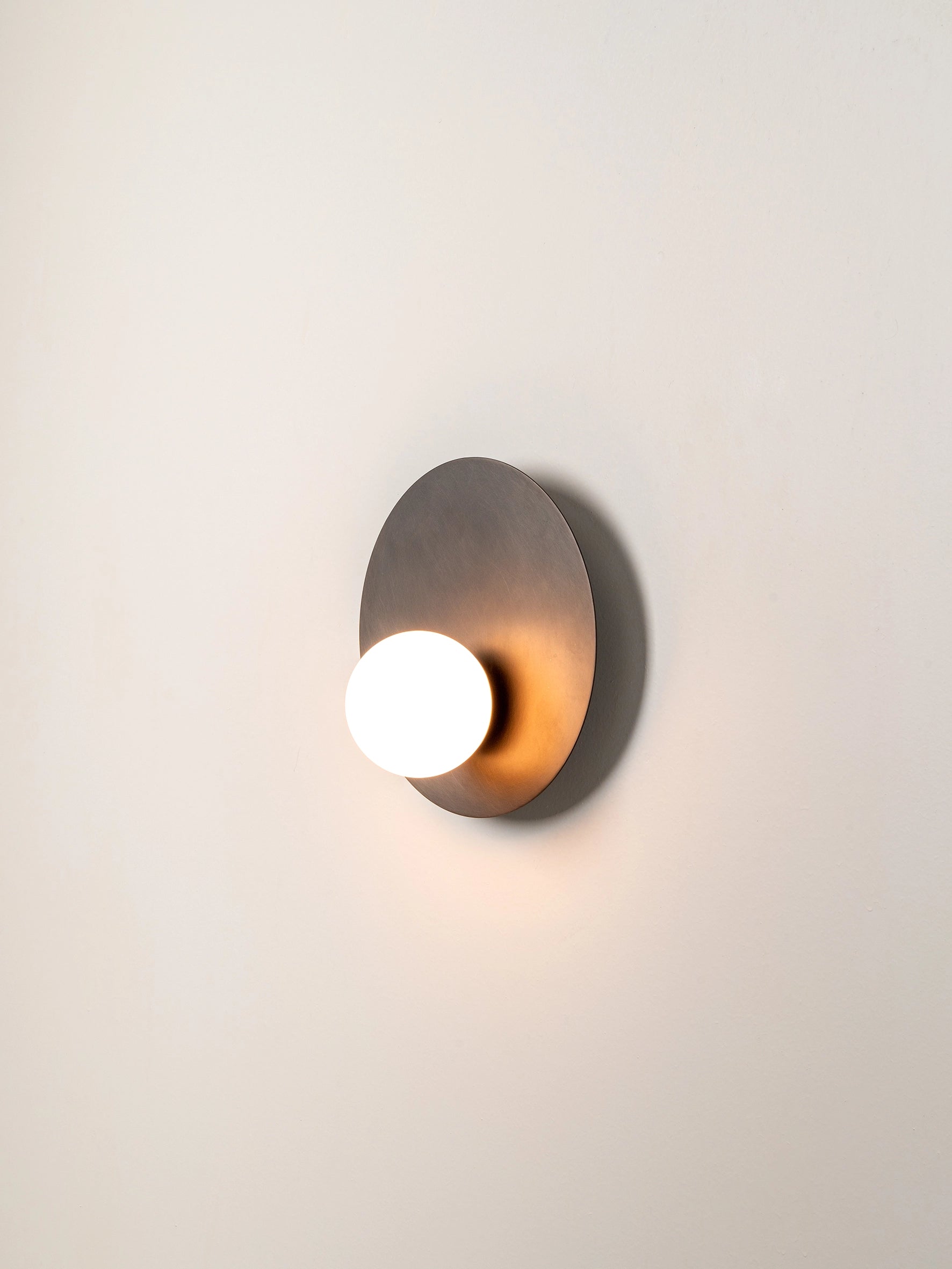 Luna - bronze and opal disc wall light | Wall light | lights & lamps | Modern affordable designer lighting