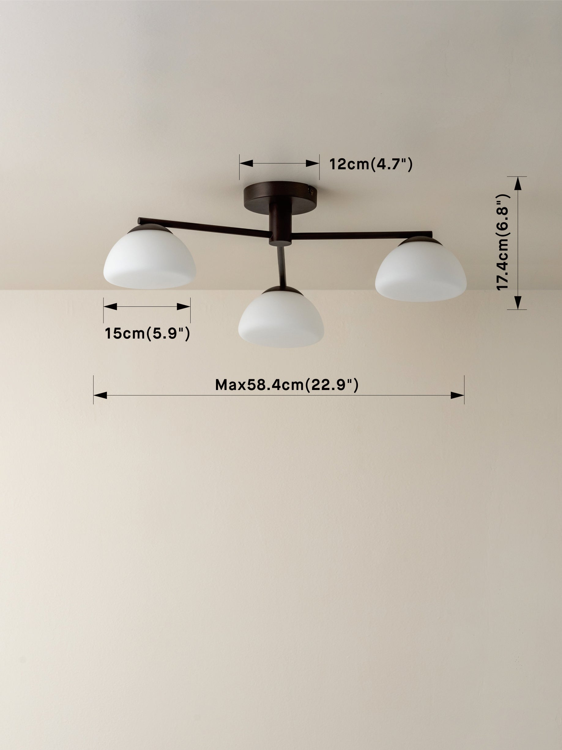 Three-light ceiling fixture with a dark metal frame and white glass shades, shown with dimension callouts for width, height, and overall span on a plain wall.