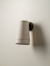 Solara - bronze and layered natural linen wall light