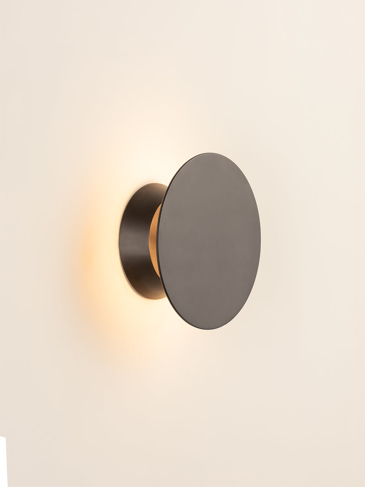 Santi - LED adjustable black disc wall light | Wall Light | Lights & Lamps | UK