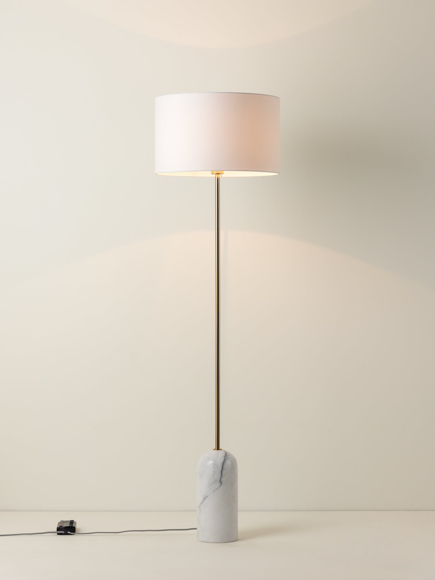 Penn - 1 light white marble and brass floor lamp